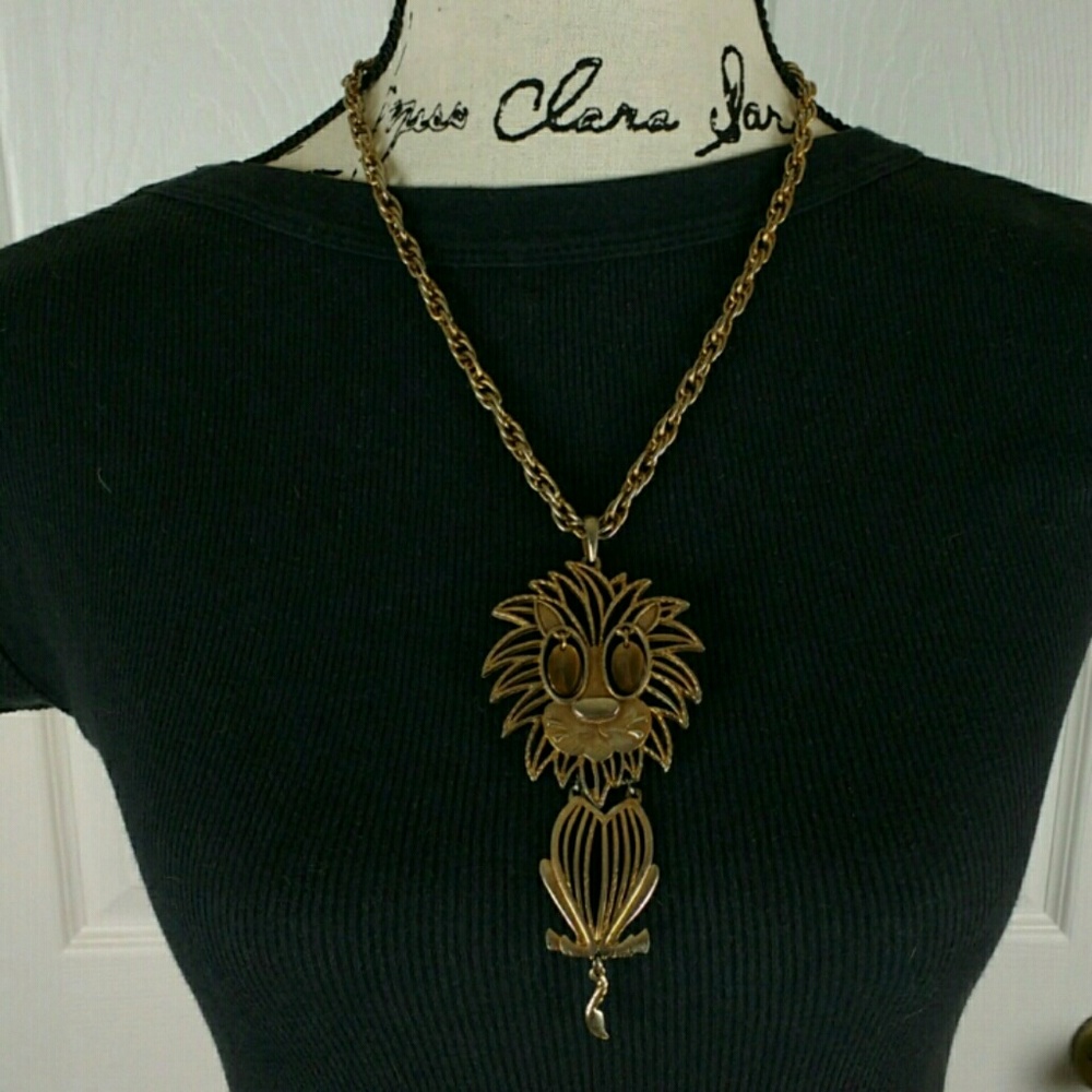 Large gold tone lion necklace, 20" long